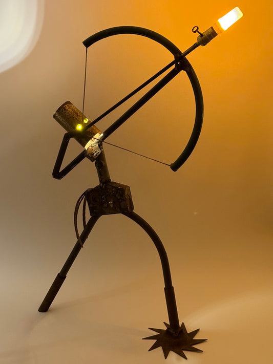 The First Draw illuminated sculptural robot lamp depicting an archer by Bobby Anderson