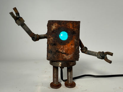 Boxy found metal robot lamp by Bobby Anderson RVA246 with glowing blue light and original rusted patina