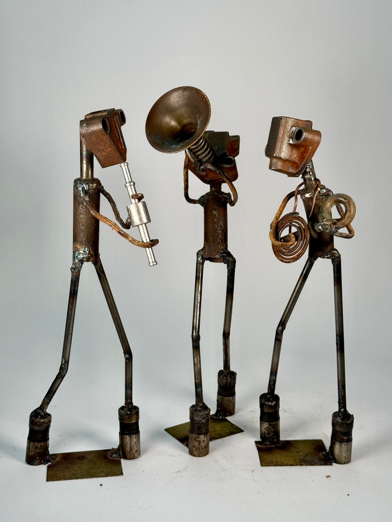 The Memtones three-piece Memphis music sculpture with trumpet guitar and woodwind players