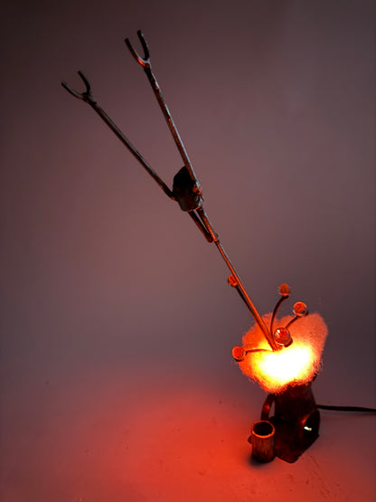 Boomer original sculptural robot lamp by Bobby Anderson, RVA246, with illuminated cannon blast and reclaimed metal construction