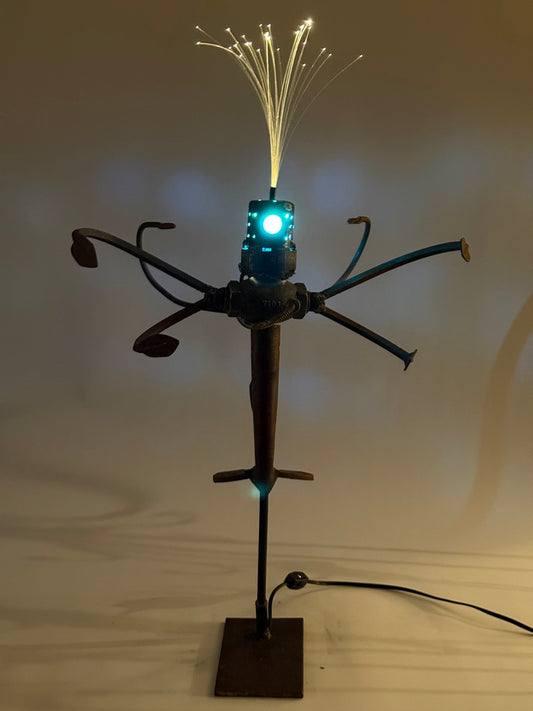 Submariner original sculptural robot lamp by Bobby Anderson with glowing diving helmet, fiber-optic antennae, and reclaimed metal construction