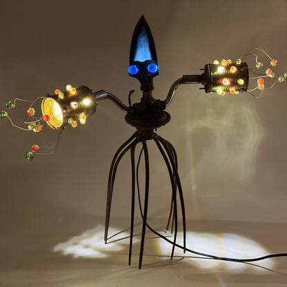 Scuttletron original alien robot lamp by Bobby Anderson, RVA246, with glowing marble lights, pitchfork legs, and reclaimed metal parts