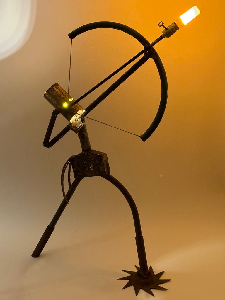 The First Draw illuminated sculptural robot lamp depicting an archer by Bobby Anderson