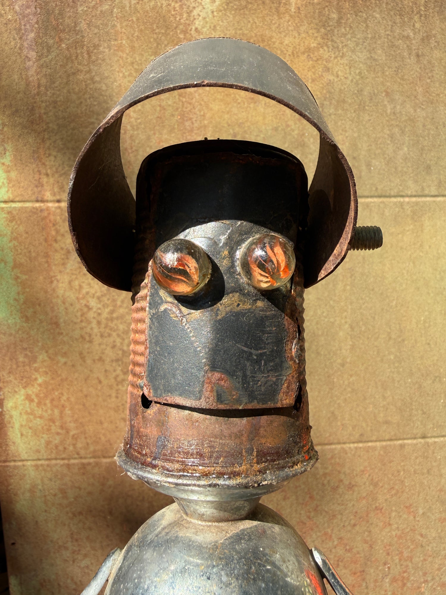 "Little Boss" by Bobby Anderson, RVA246 Creative Studio's second in command, robot sidekick, studio mascot, and jobsite whipcracker. Part soup can. Part sugar bowl. Famous for blue collar ethos with galactic travel experience and, of course, "Welp, back to work." 