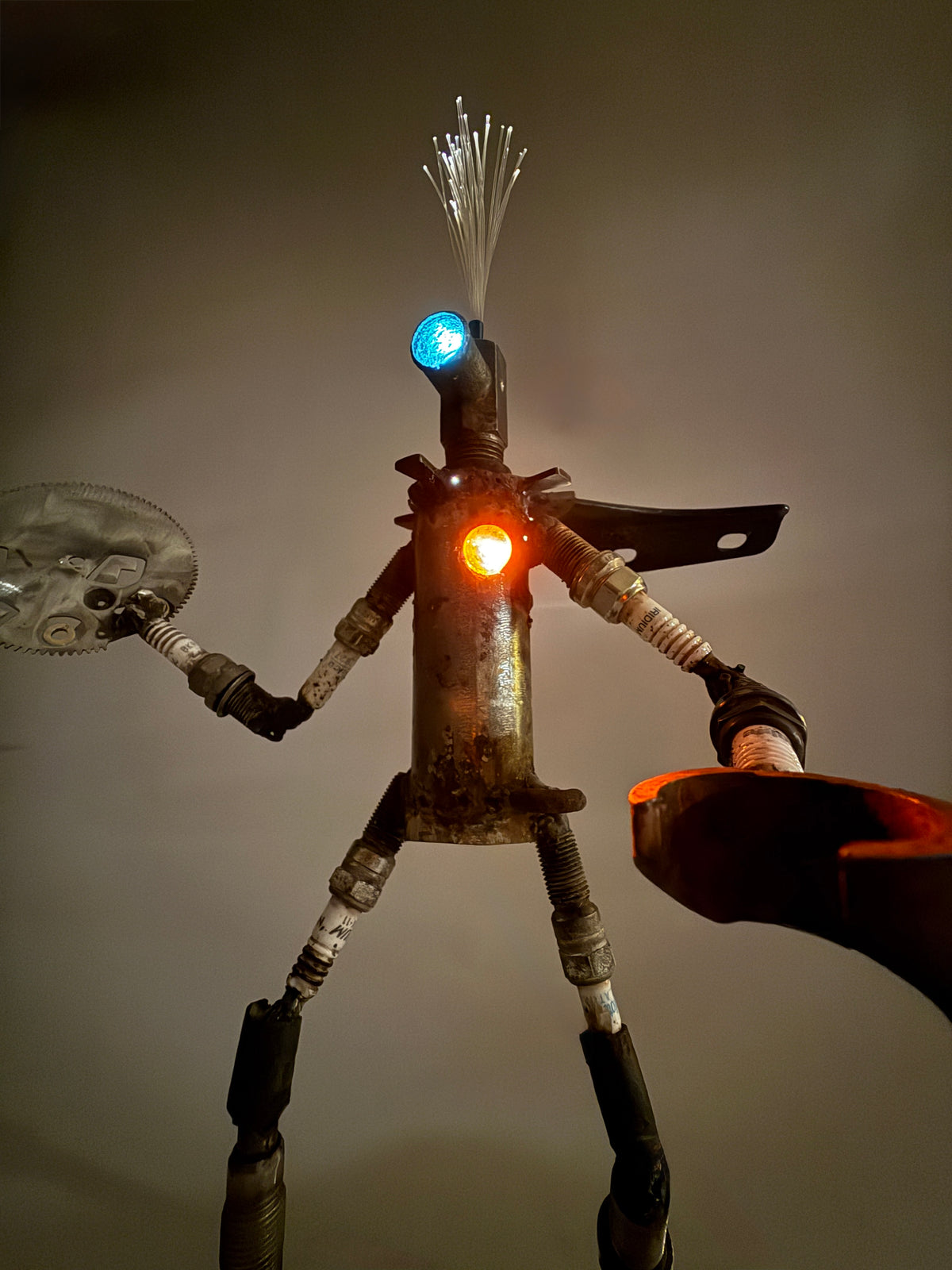 Sparky original robot lamp and sculptural lighting by Bobby Anderson, RVA246, made from reclaimed metal, spark plugs, found objects, and fiber optics