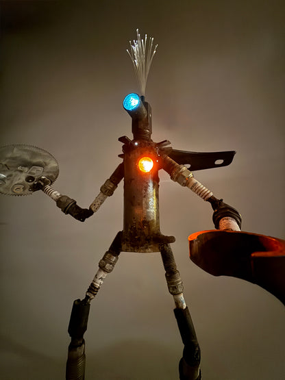 Sparky original robot lamp and sculptural lighting by Bobby Anderson, RVA246, made from reclaimed metal, spark plugs, found objects, and fiber optics
